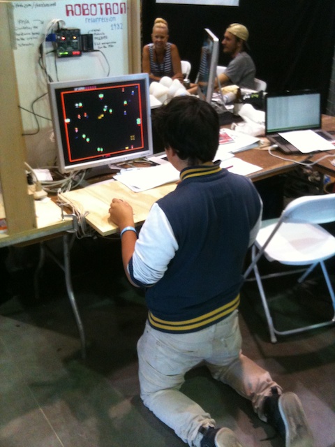 Maker Faire attendee knows proper Robotron playing style.